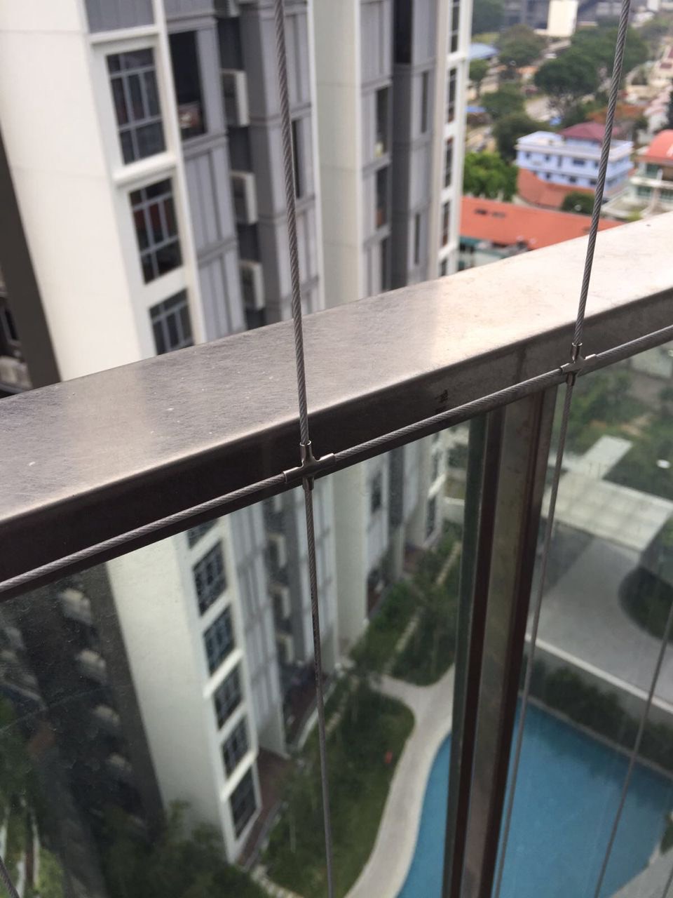 Balcony · High-floor invisible grille installation in Singapore