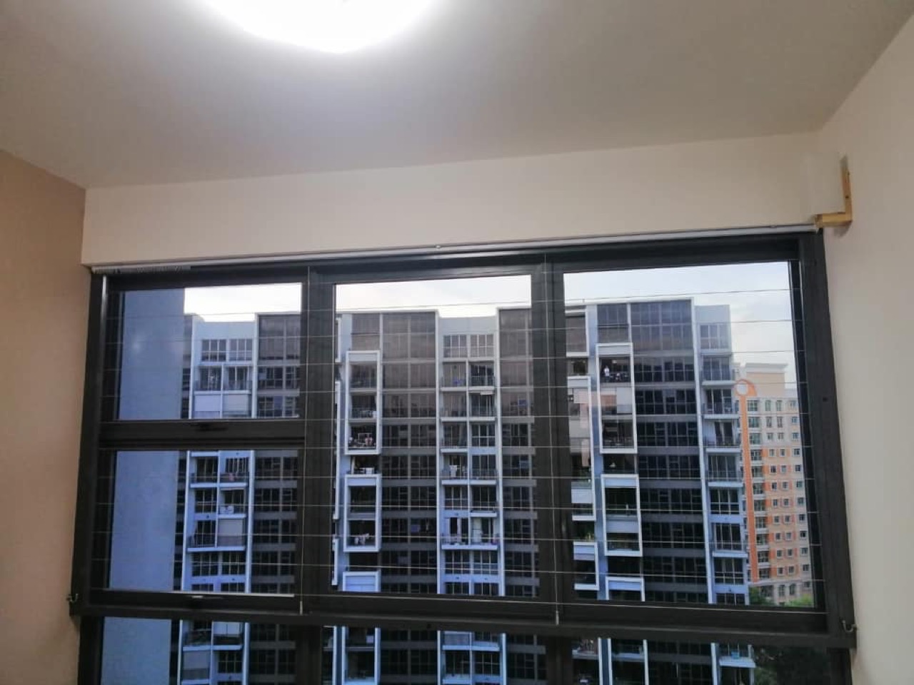 Window · Fixed Frame invisible grille installation in Singapore